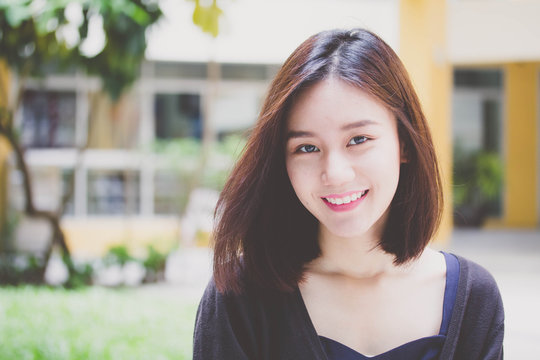 thai adult student university beautiful girl relax and smile