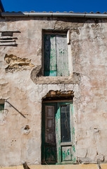 Fototapeta na wymiar The wall of the old house. City Agrigento. Sicily, Italy