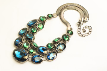 Necklace of blue and green stones closeup