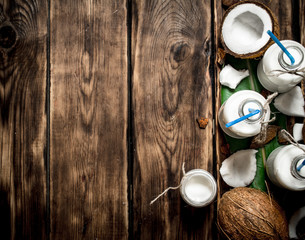 Coconut milk in bottles.