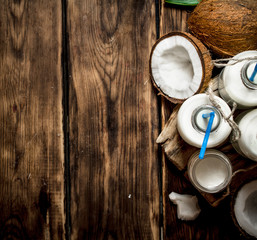 Coconut milk in bottles.