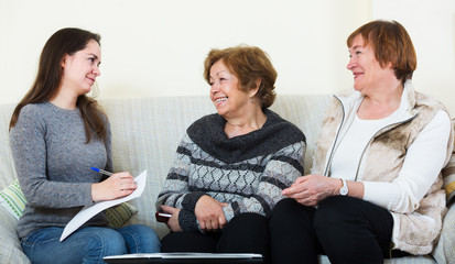 Senior women consulting with banking agent