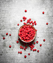 Aromatic raspberries in a bowl.