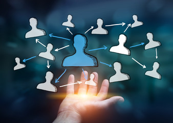 Businessman holding hand drawn social network