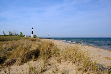 Fototapeta na wymiar Big Sable Point Lighthouse in dunes, built in 1867