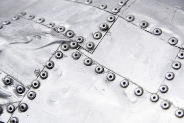 Metal background with rivets