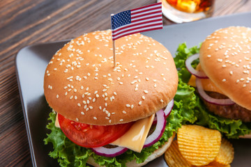 Hamburgers on wooden background