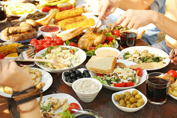 Friends eating on picnic