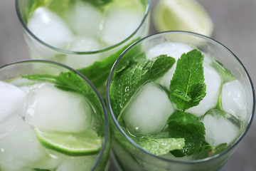 Cold fresh cocktails with lime, closeup
