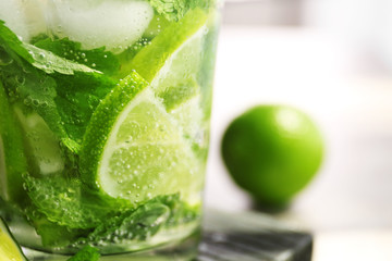 Cold fresh cocktail with lime, closeup