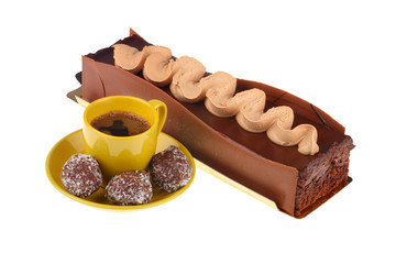 chocolate cake with cup of coffee and chocolate balls,  isolated