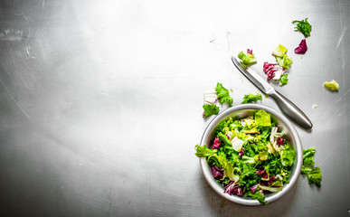 Fototapeta na wymiar salad of fresh greens.