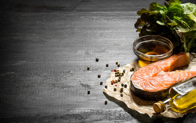 Raw salmon with olive oil, spices and herbs.