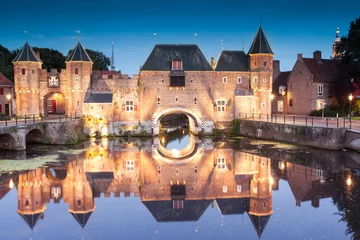 Poster Im Rahmen Koppelpoort medieval Dutch fortress city Amersfoort at night, Netherlands © fotolupa
