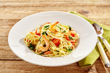 Gourmet seafood pasta with shrimp tails