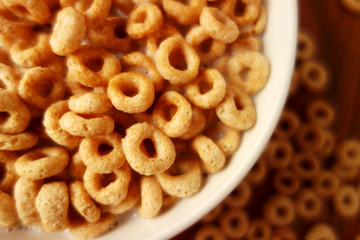 Cheerios - Bowl with cheerios whole grain cereals. 