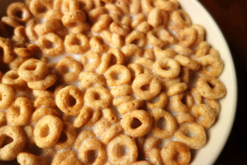 Cheerios - Bowl with cheerios whole grain cereals. 