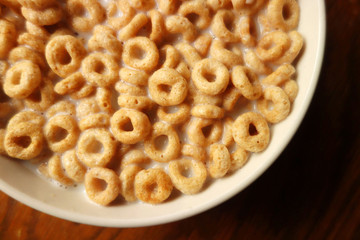 Cheerios - Bowl with cheerios whole grain cereals. 