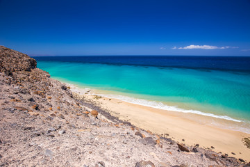 Fototapeta na wymiar Esquinzo sandy beach with vulcanic mountains, Jandia, Fuerteventura, Canary Islands, Spain