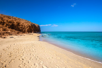 Sandy beach Mal Nobre with vulcanic mountains, Jandia, Fuerteventura island, Canary Islands, Spain