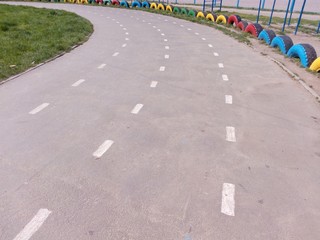 Obraz premium Turn the treadmill on a school stadium