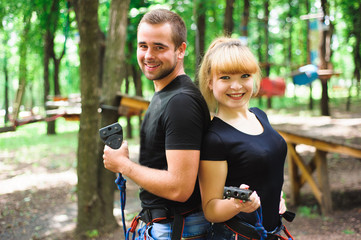 Hiking in the rope park two young people