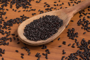 Black Rice into a Spoon