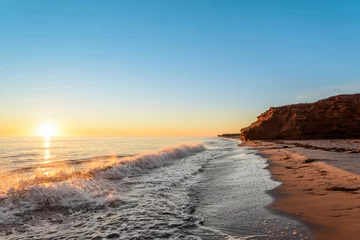 Fotobehang Kust Oceaankust bij zonsopgang