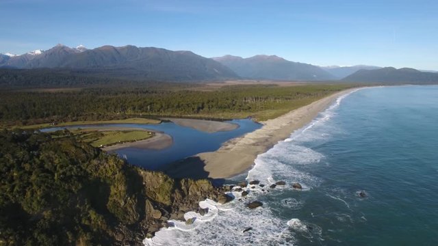 Spectacular aerial shot of Bruce Bay and the Southern Alps, New Zealand
