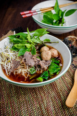 asian noodle soup with beef meatball with fresh vegetable