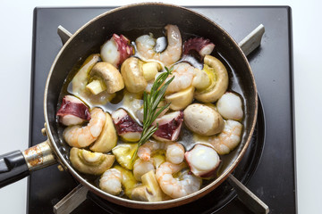 Sauteed seafood with shrimp, octopus, mushroom and rosemarry in