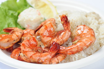 Fried shrimp prawn with meat ball and plain rice in white bowl