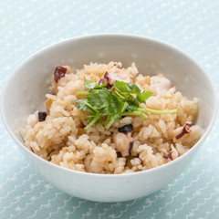 Fried rice with cumin herbs in white bowl