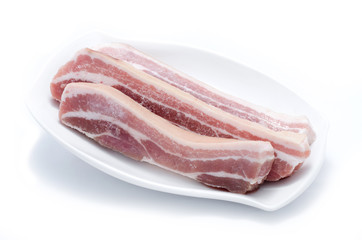 Pork sticks on white plate