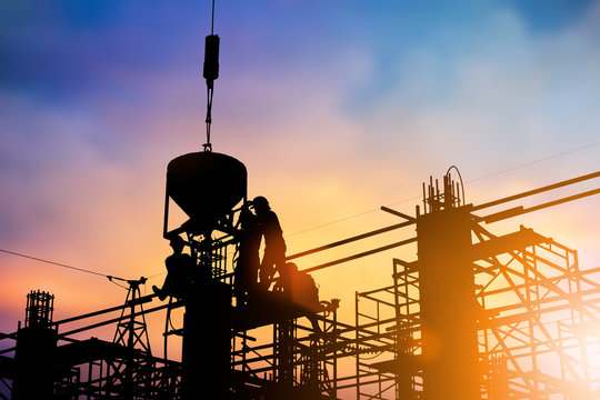 Silhouette of construction workers to work safely on a high with