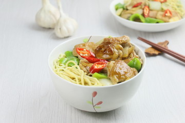 Bowl of Instant chicken noodle on the table