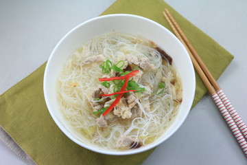 Bowl of vietnamese rice vermicelli noodle with beef on the table
