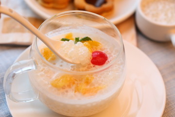 Cold sweet soup of jelly and fruit in glass cup in asia