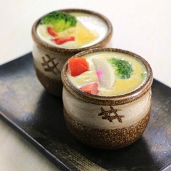 Japanese chawanmushi or fresh vegetable soup in small bowl