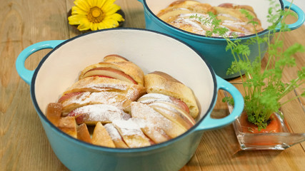 Junior baked apple french toast in white stew on the table