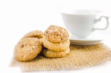 Extreme close-up image of chocolate chips cookies on white background