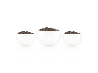 Coffee beans in white glass of coffee isolated on white backgrou