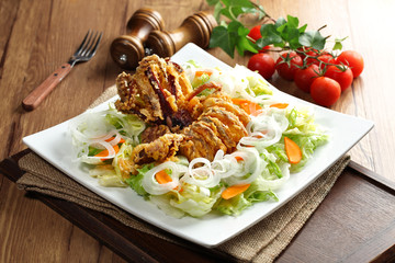 A new concept of eating salads crispy and spicy fried squid with
