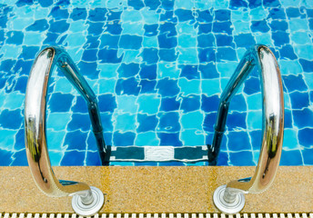 Swimming pool with stair at the Clubhouse close up.