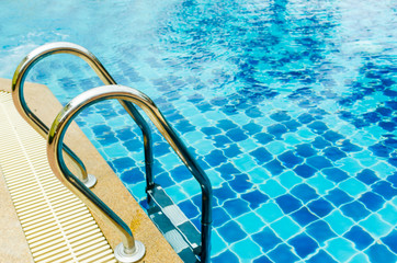 Swimming pool with stair at the Clubhouse close up.