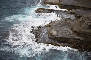 Waves crashing on Rocks