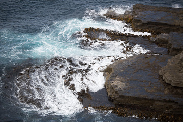 Waves crashing on Rocks