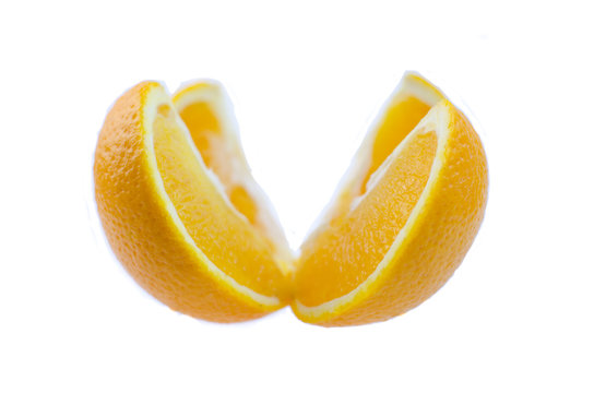 Slices of orange on a white background.