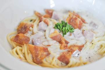 Carbonara spaghetti with ham and bacon  or spaghetti