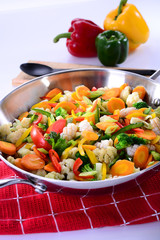 Sauteed vegetables with octopus, squid, carrots, chili, broccoli